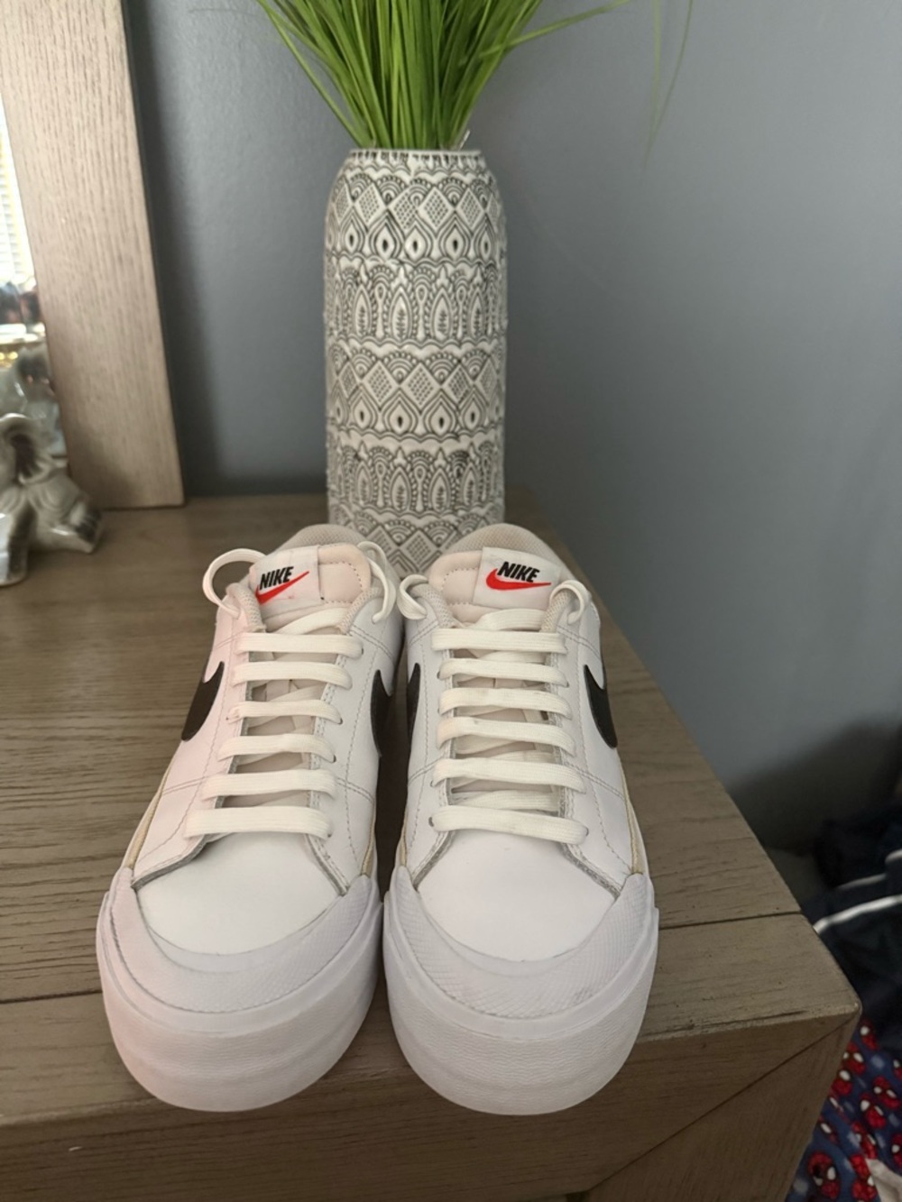 Nike White Low-Top Sneakers with Black Swoosh and Gold Accent - Picture 3 of 3